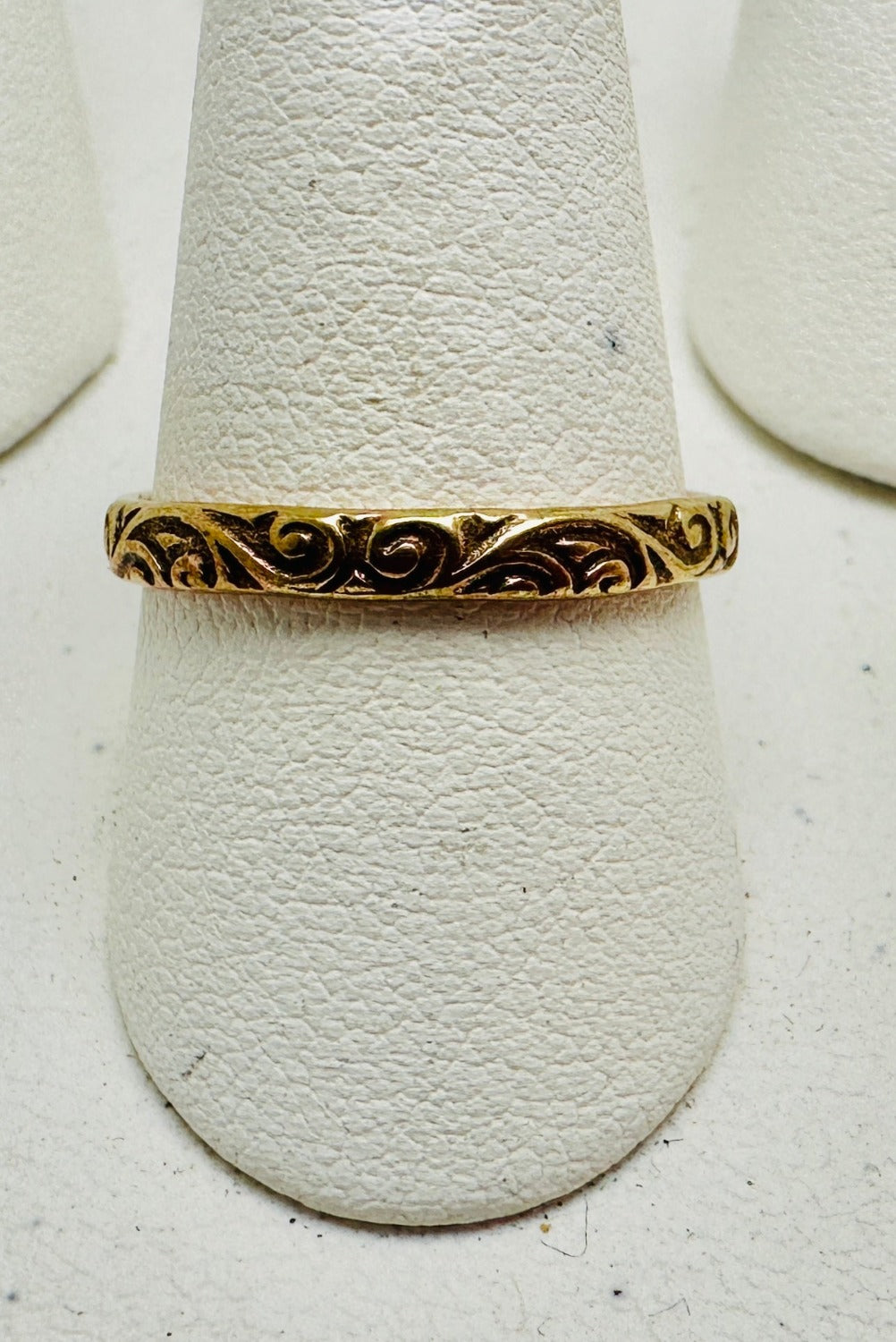 Flourish pattern brass ring